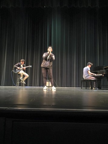 Ben Madeo, Hoon Cho, and Michael Crouch perform a pop medley.