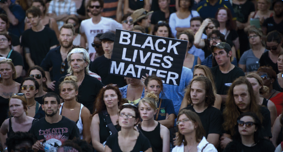 Thousands stood to protest the racist shooting committed by Roof after the lives of his victims were lost.