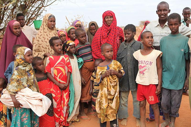 Courtesy of Oxam East Africa. Refugee families group together at Dadaab for shelter.