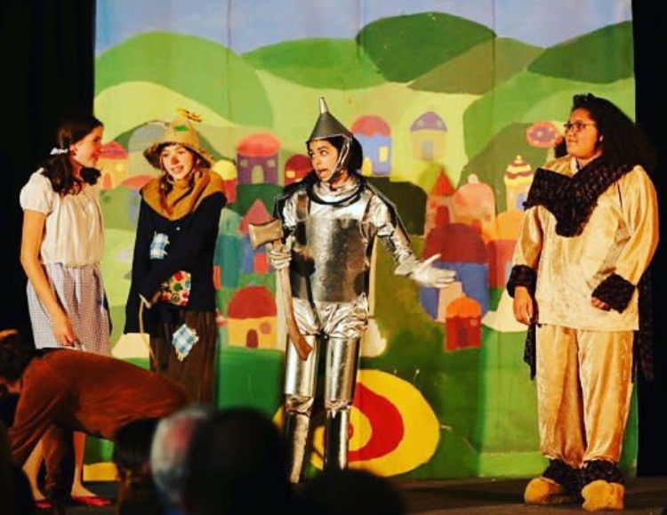 COURTESY OF  Maya Raman
Maya Raman (center) as the Tin Man in the Roberta Jones Theater production of the Wizard of Oz.