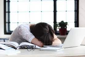 Students become exhausted as they have to stay up late doing homework. 