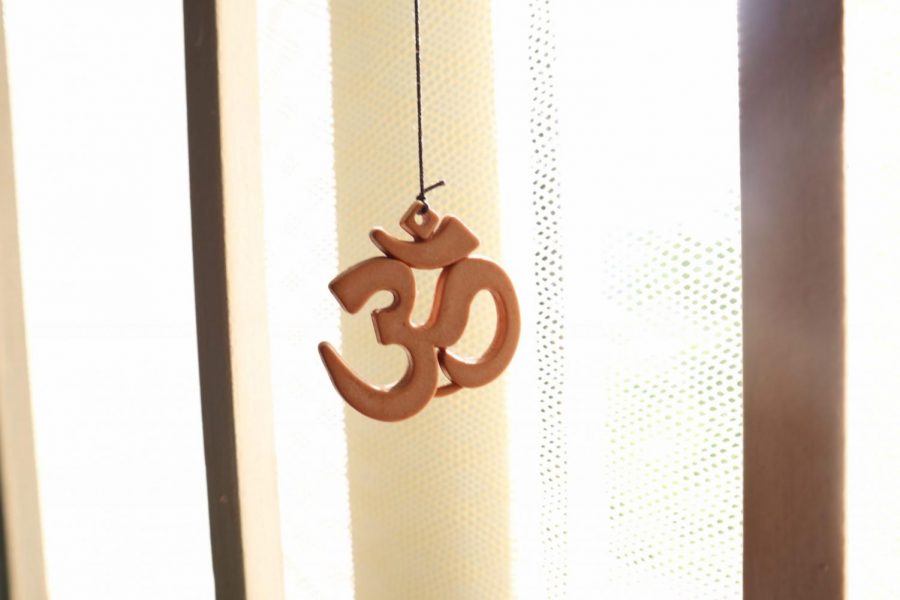 Om+symbol+that+was+turned+into+an+earring+for+aesthetics.+Courtesy+of+Kishore+Kumar.