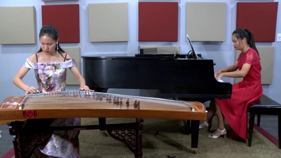 Ankie Tong and her sister, Annie Tong, performing their duet of Piano and Guzheng playing the piece called, 
