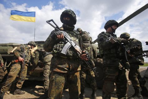 Ukrainain soldiers waiting to deploy 
credit: Getty Images 