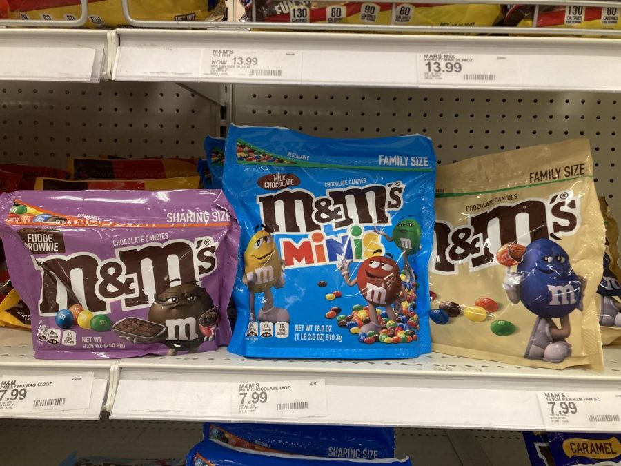 M&M mascots, including the red, green, yellow, blue, and new brown M&M, are featured on the candys packaging. Courtesy of Elena De Schutter.