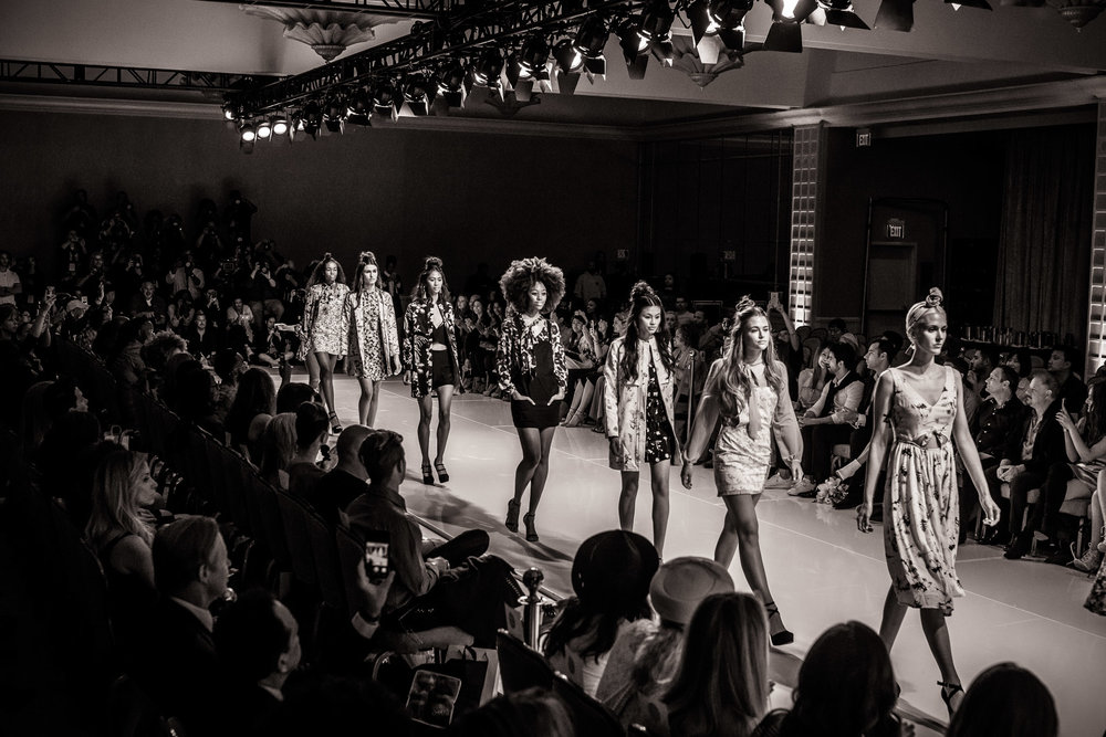 Models walk the runway at NYFW.
