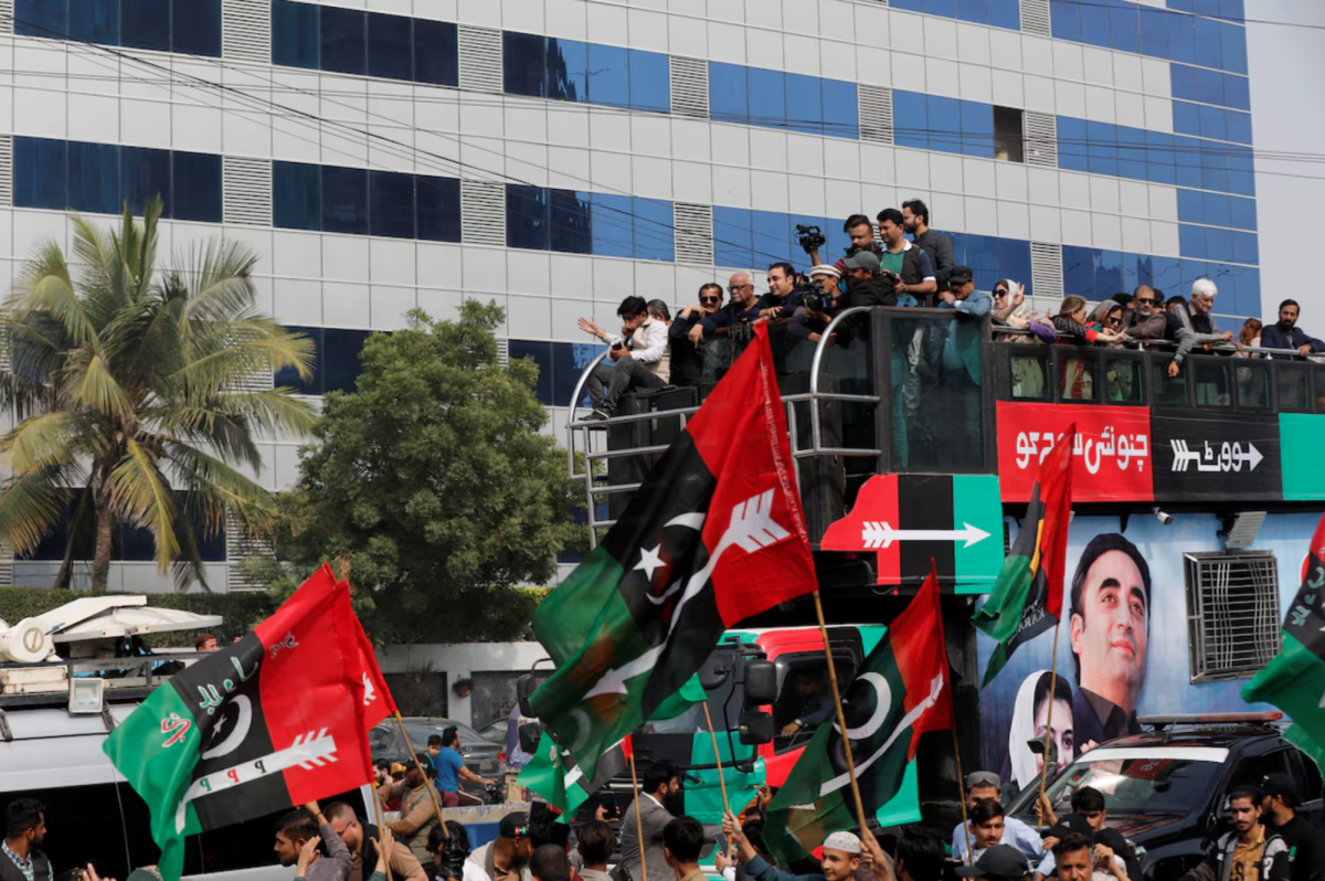 Supporters+of+Bilawal+Bhutto+Zardari+gather+around+his+vehicle+during+an+election+campaign+rally.