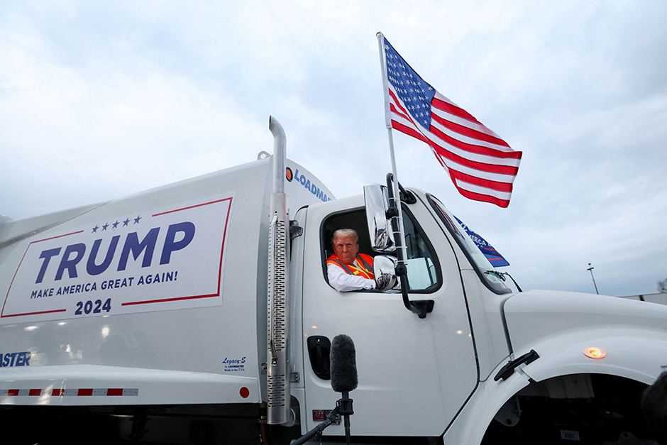 Trump drives a garbage truck in his campaign in response to Biden's comment.