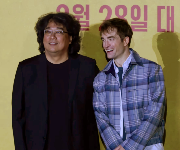 Mickey 17 director Bong Joon Ho (left) and lead actor Robert Patterson (right).