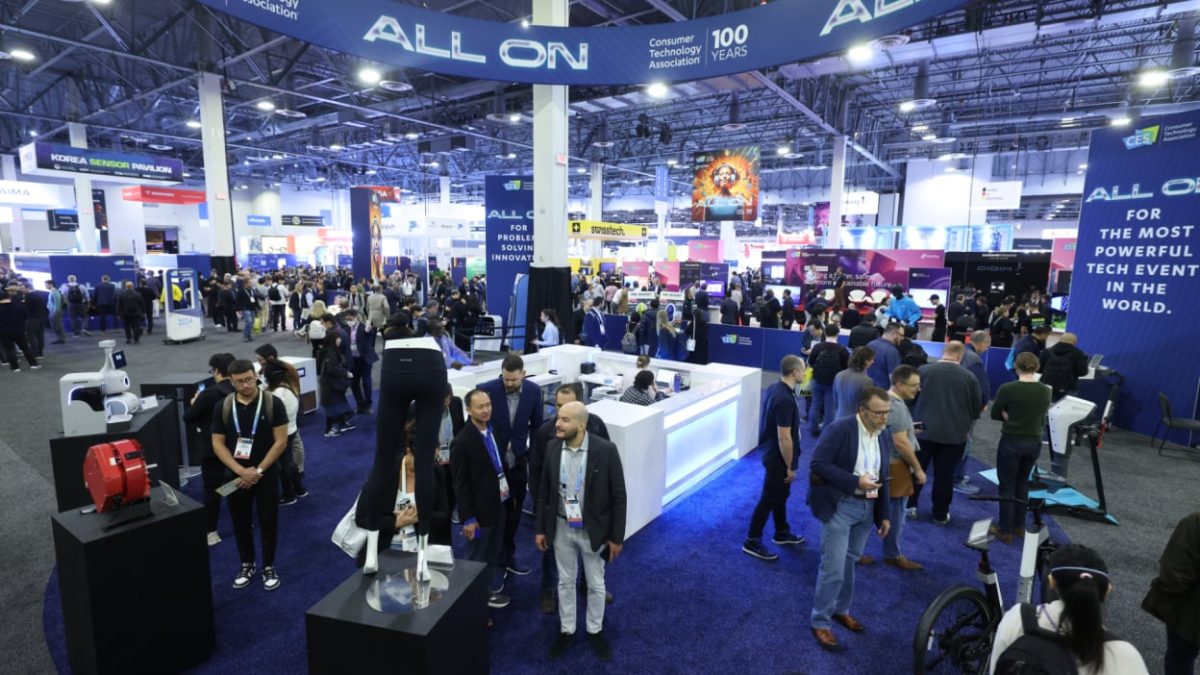 People networking at CES.