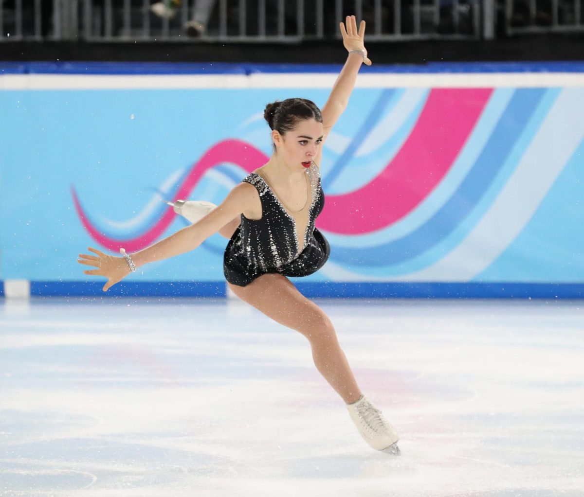 Figure skater landing a jump