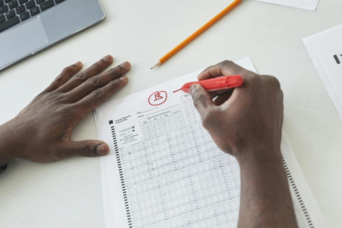 A teacher grading a test.