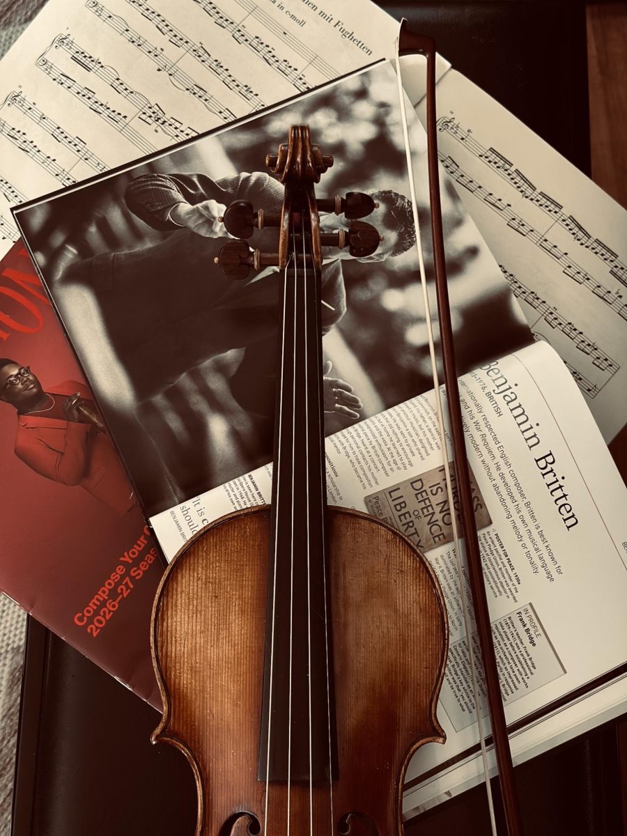 Violin and music books. 