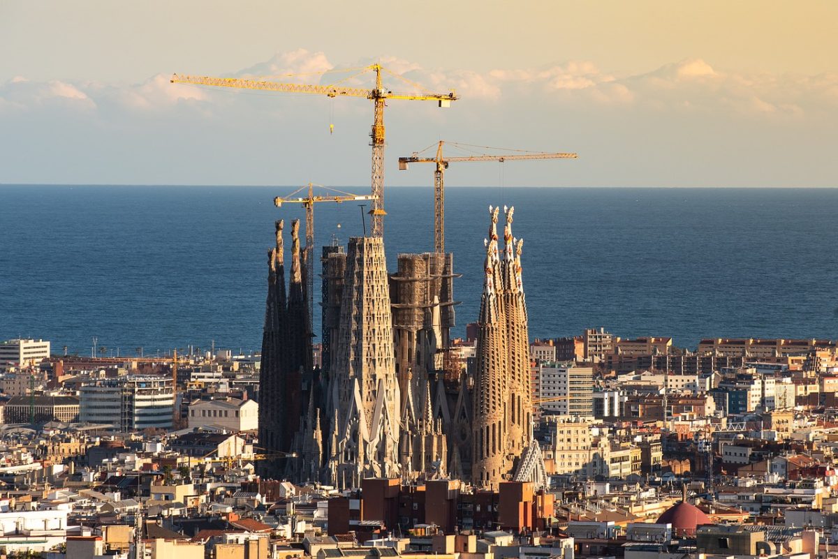 The Basílica de la Sagrada Família overlooking the Mediterranian Sea. 