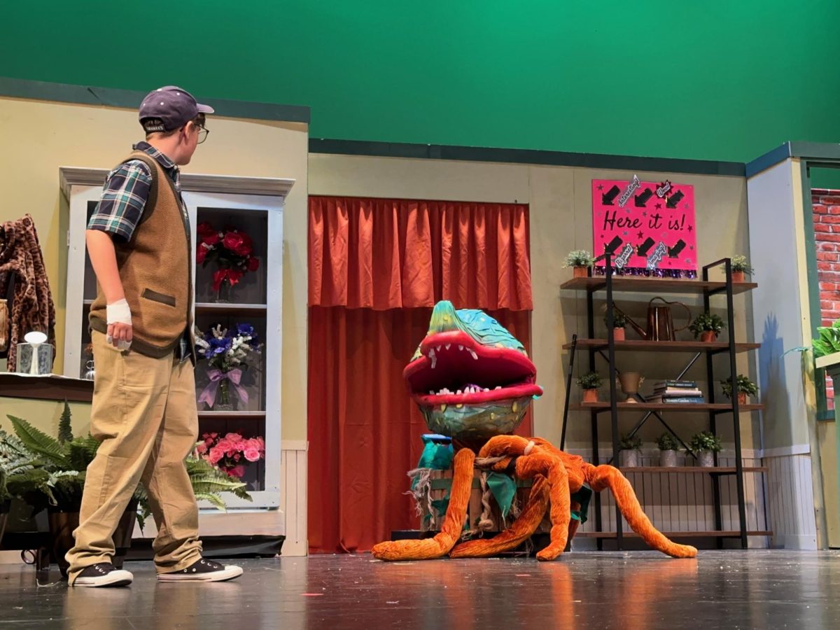 Carnivorous plant talking to Seymour.